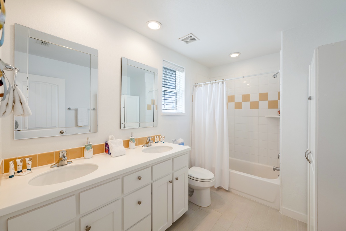 Unwind in your bright, spacious bathroom with dual sinks and a relaxing tub-shower combo for refreshing mornings.