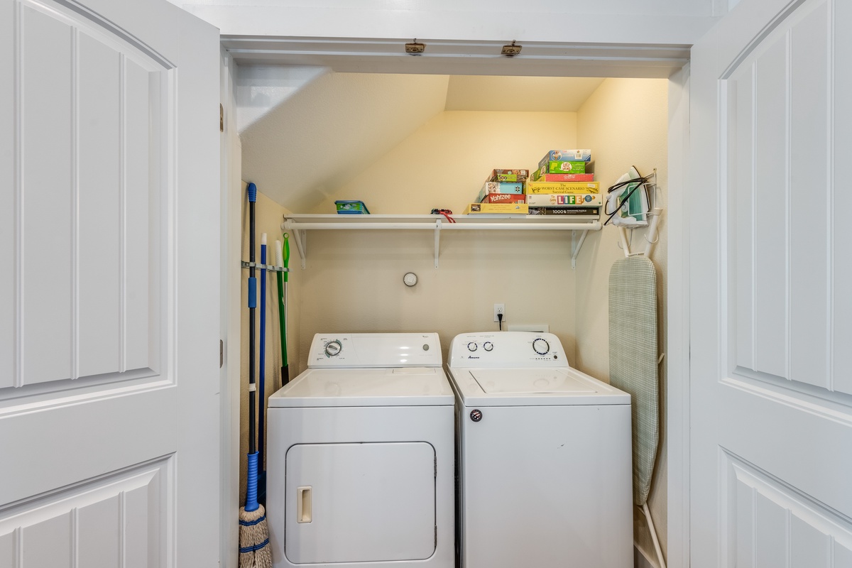 Your private laundry nook keeps your vacation wardrobe fresh with a full-size washer and dryer, plus handy storage for all your essentials.