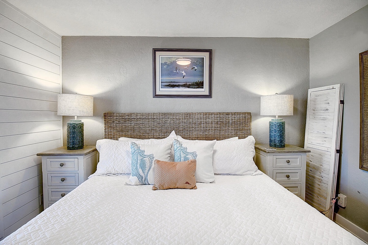 Drift off in this coastal-inspired bedroom with soft linens and calming blues that welcome peaceful nights.