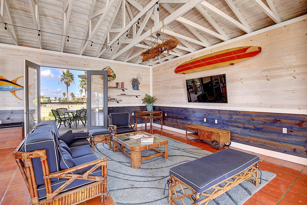 Unwind in your surf-inspired haven with exposed beams, bamboo furnishings, and coastal charm flowing seamlessly onto your private patio.