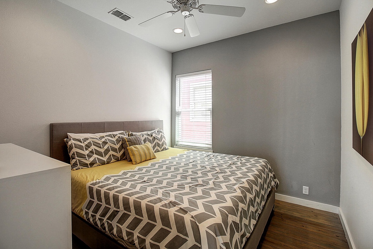 Rest peacefully in your stylish retreat with geometric patterns and golden accents creating the perfect blend of comfort and modern sophistication.