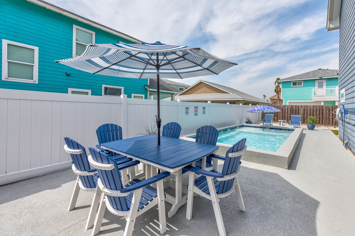 Your private poolside paradise awaits with shaded dining for eight and crystal-clear waters to cool off after sunny beach days.