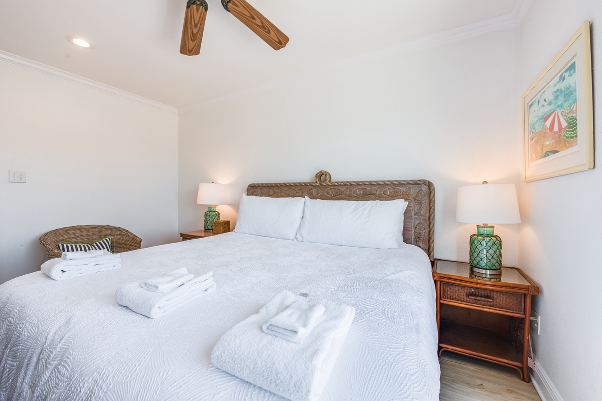 Drift into peaceful sleep in your serene bedroom with coastal touches, crisp linens, and warm lighting.