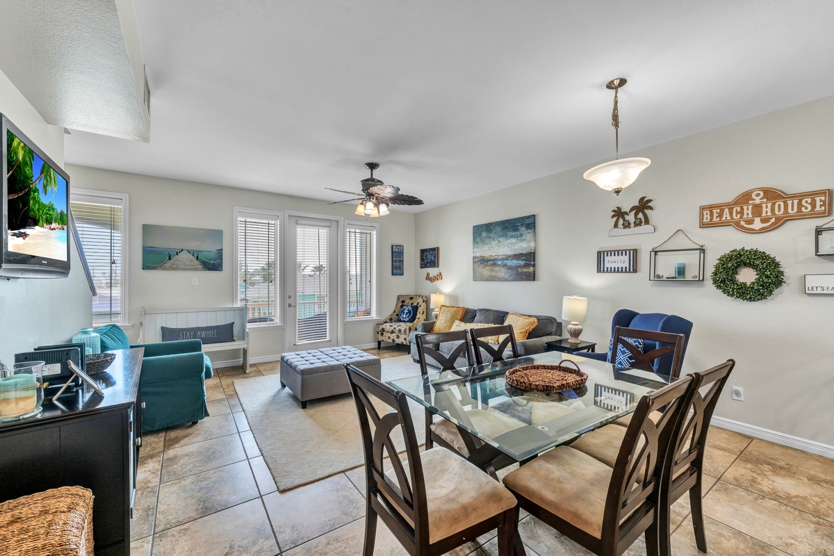 You'll love this coastal-themed living space where beach house charm meets modern comfort, perfect for gathering with family.