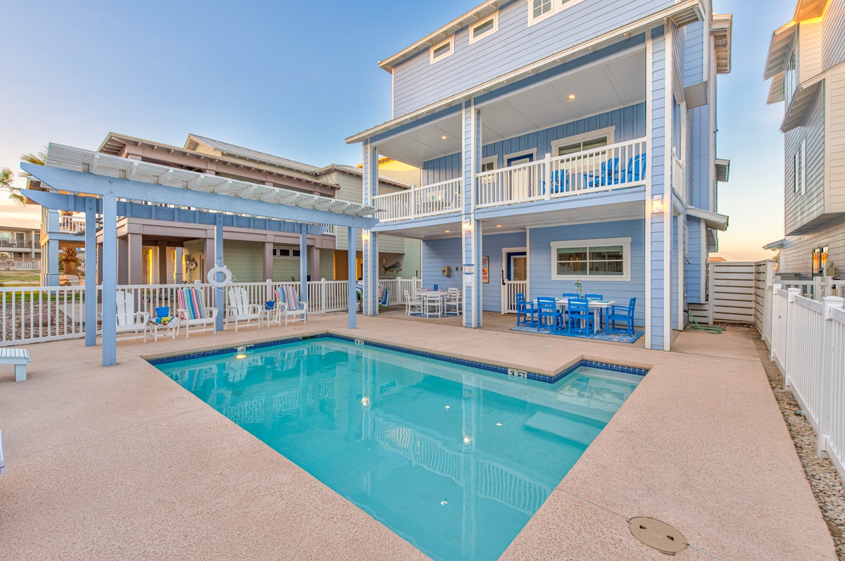 Charming coastal retreat with private pool, covered dining area, and spacious balconies perfect for seaside relaxation.