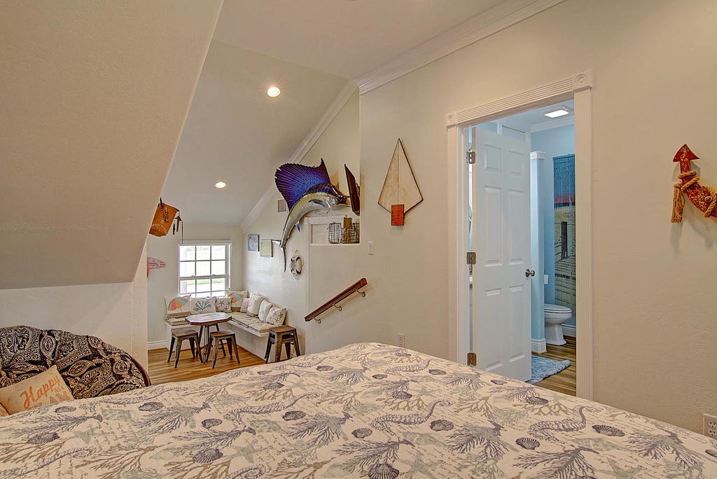 Cozy nautical bedroom with fun maritime decor and your own ensuite bathroom for comfort and convenience.