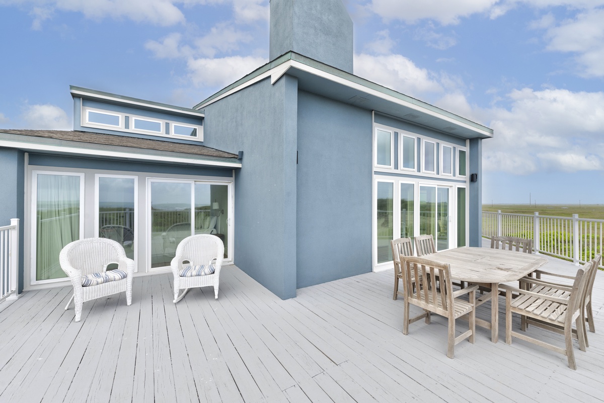 Step onto your private deck where ocean breezes and endless sky views create the perfect outdoor dining and relaxation retreat.