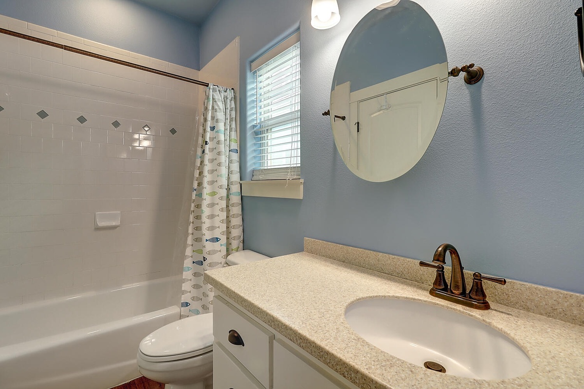 Refresh in your private bathroom with a spacious tub-shower combo, perfect for unwinding after exploring.