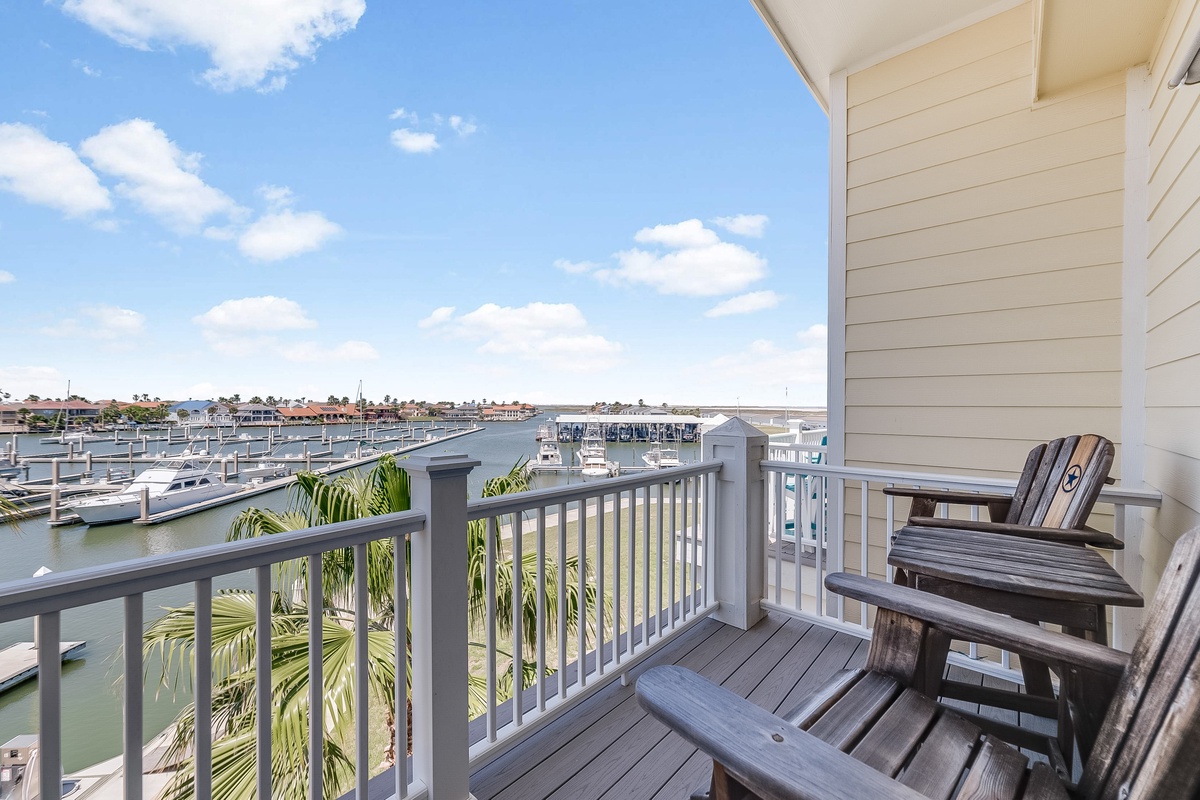 Step onto your private balcony and soak in stunning marina views while sipping morning coffee in comfortable Adirondack chairs.