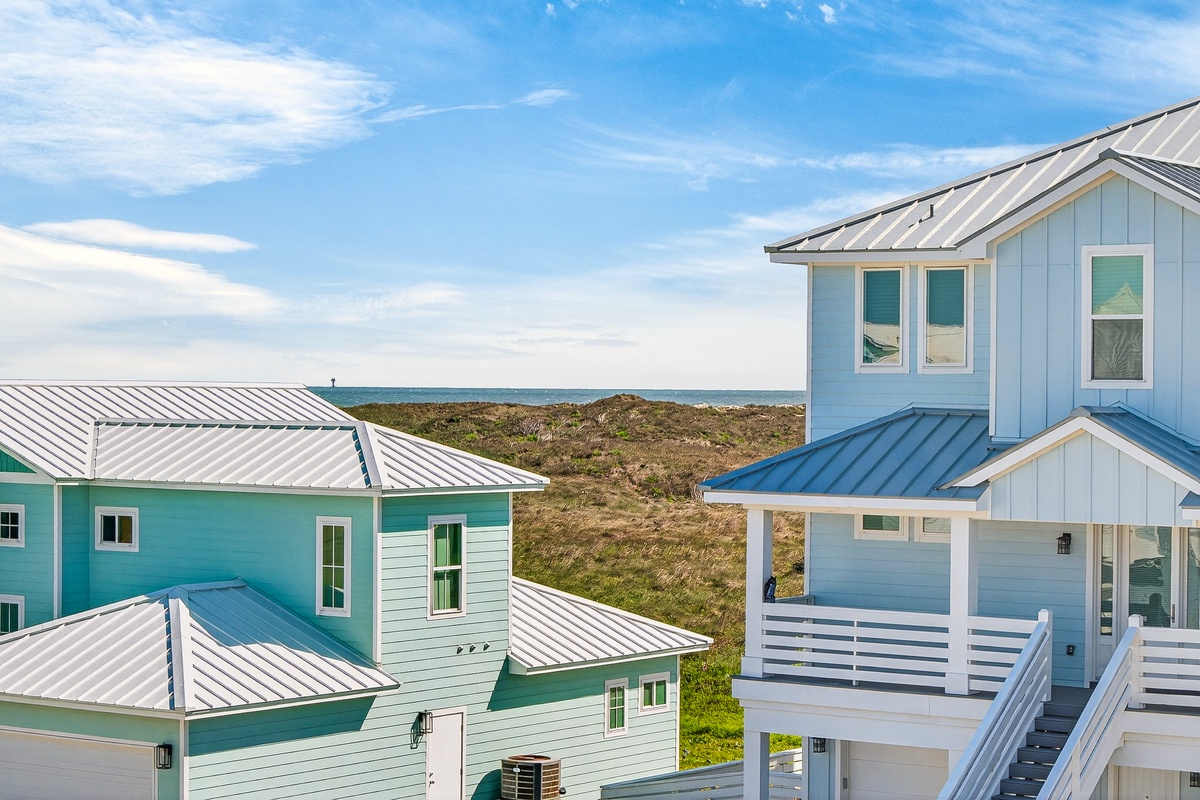 Coastal vacation homes with ocean views and direct beach access, perfectly positioned for a seaside escape.