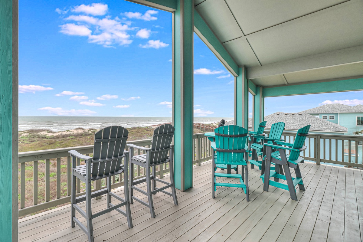 Sip your morning coffee on this covered deck with stunning ocean views and comfortable seating for the whole group.
