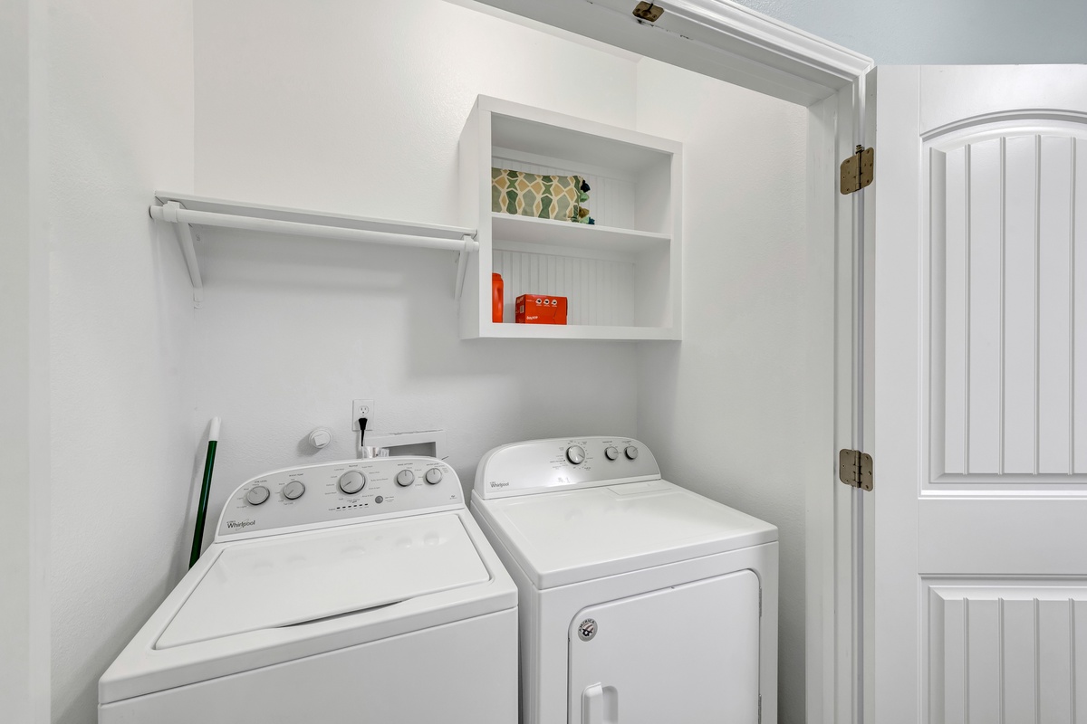 Your private laundry room keeps your clothes fresh throughout your stay, with convenient storage and hanging space for easy organization.