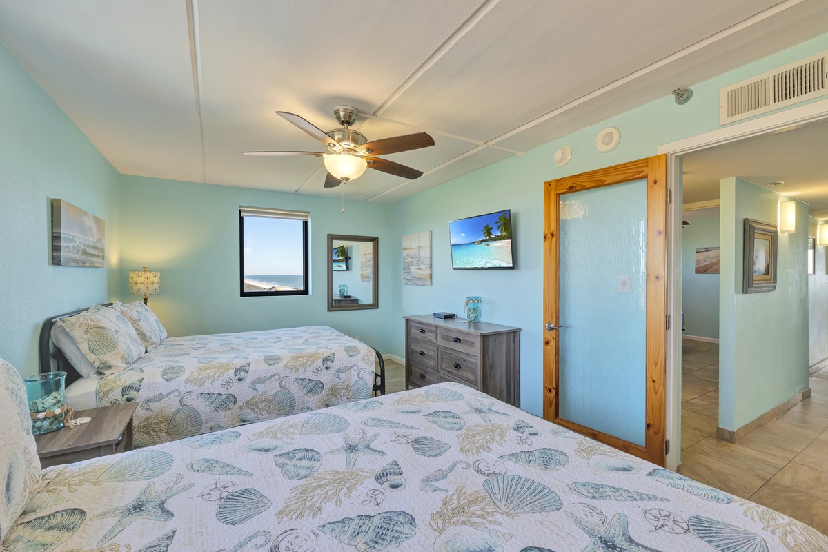 Drift off in coastal comfort with ocean views and shell-patterned linens creating your perfect seaside sanctuary.