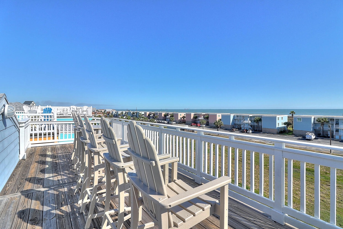 Sip your morning coffee in these cozy deck chairs while soaking in stunning ocean views from your private balcony.