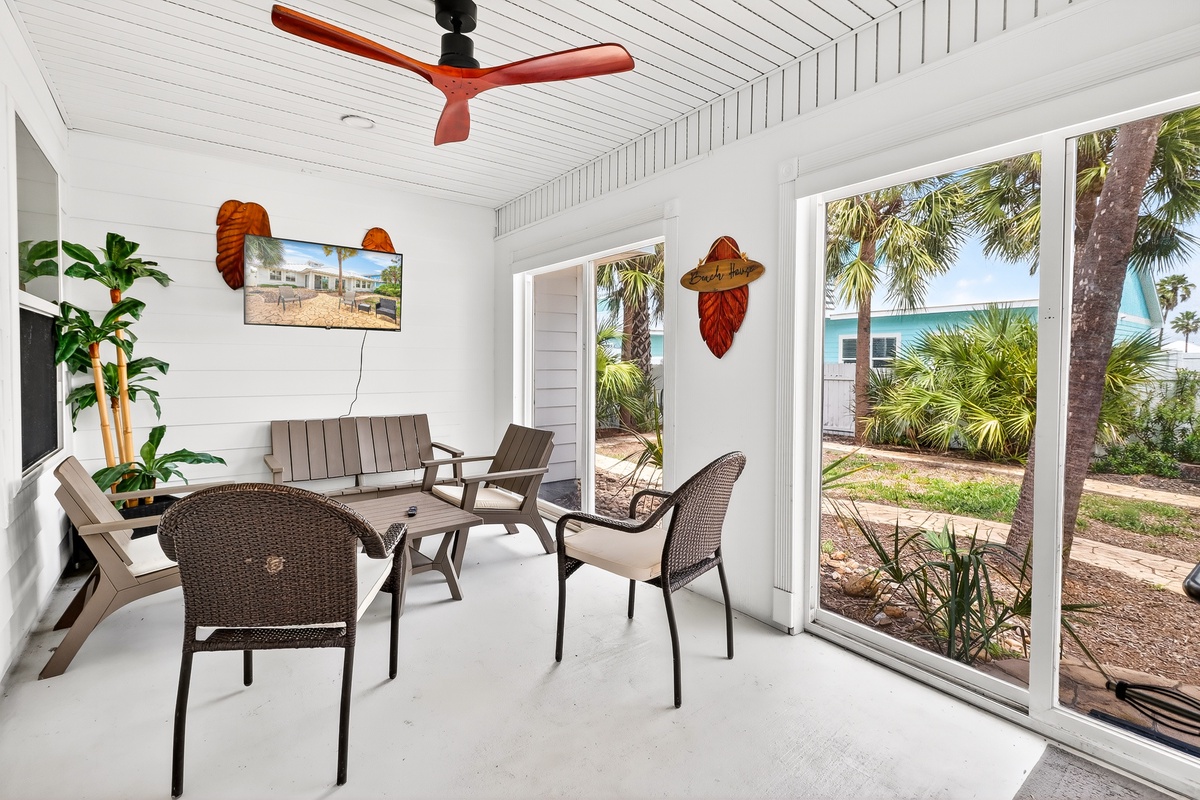 Relax in your private covered patio with tropical views and comfortable seating for meals or evening conversations.