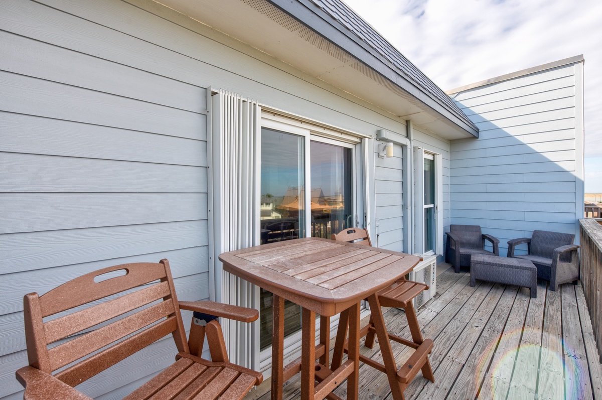 Your private deck offers the perfect spot for morning coffee or evening drinks with comfortable outdoor furniture.