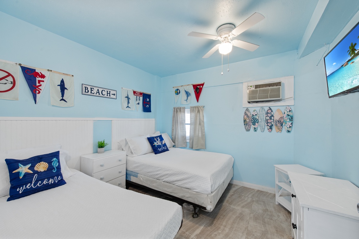 Drift off in this charming coastal bedroom where nautical décor and twin beds create your perfect beach getaway retreat.
