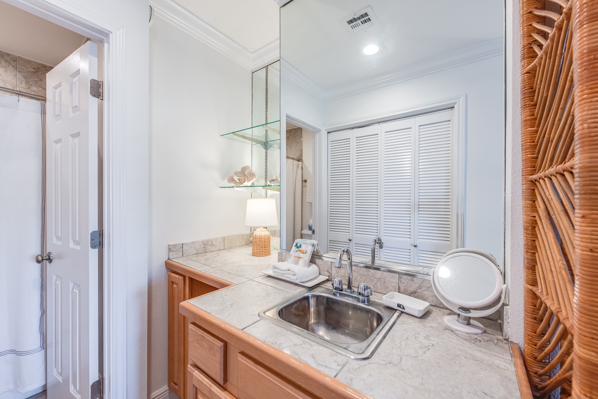 Your private wet bar features marble countertops, stainless steel sink, and elegant storage for evening refreshments.