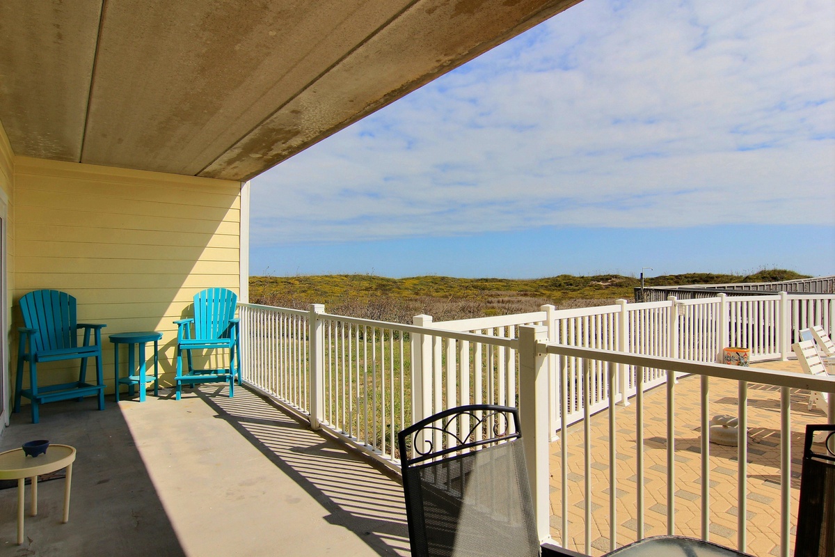 Step onto your private balcony and breathe in the coastal air while overlooking pristine dunes and endless sky views.