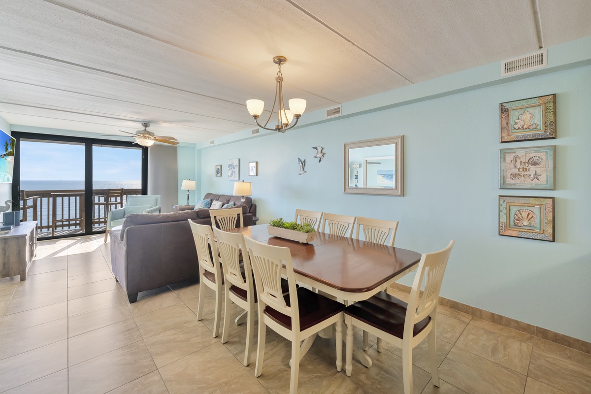 Gather around your spacious dining table for eight while coastal breezes flow through sliding doors to your private oceanfront balcony.