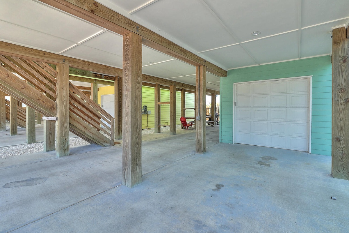Your spacious covered parking area provides secure shelter for your vehicle, with easy access to your beach retreat.