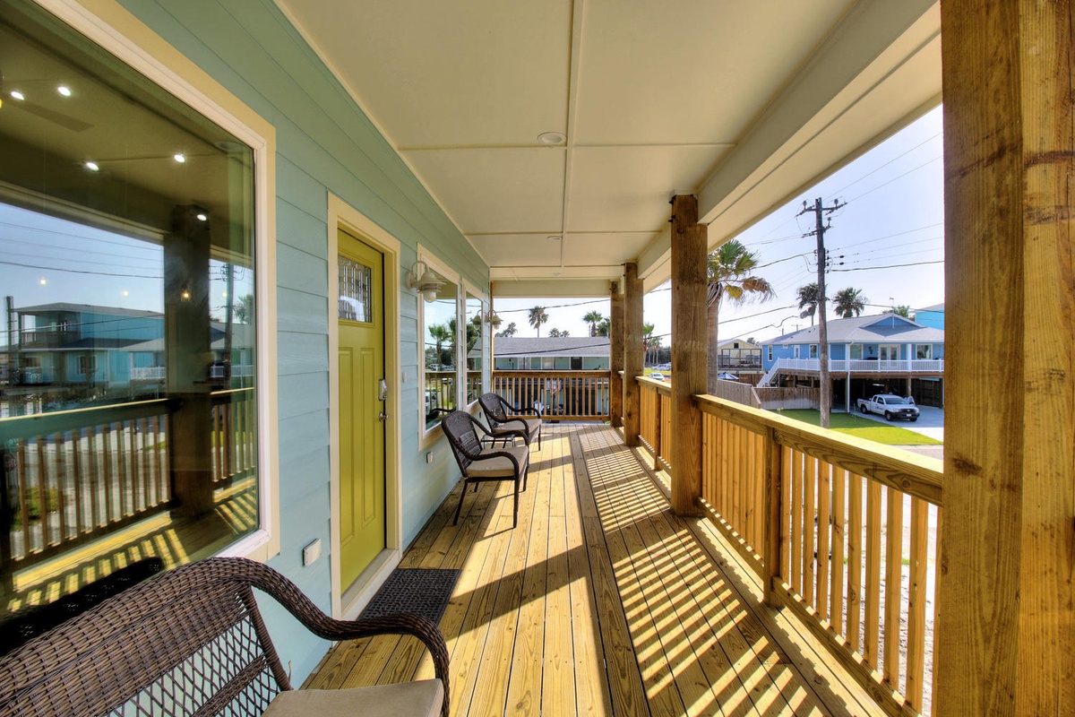 Stretch out in your private covered porch, where comfortable seating awaits and tropical breezes flow freely through this peaceful retreat.