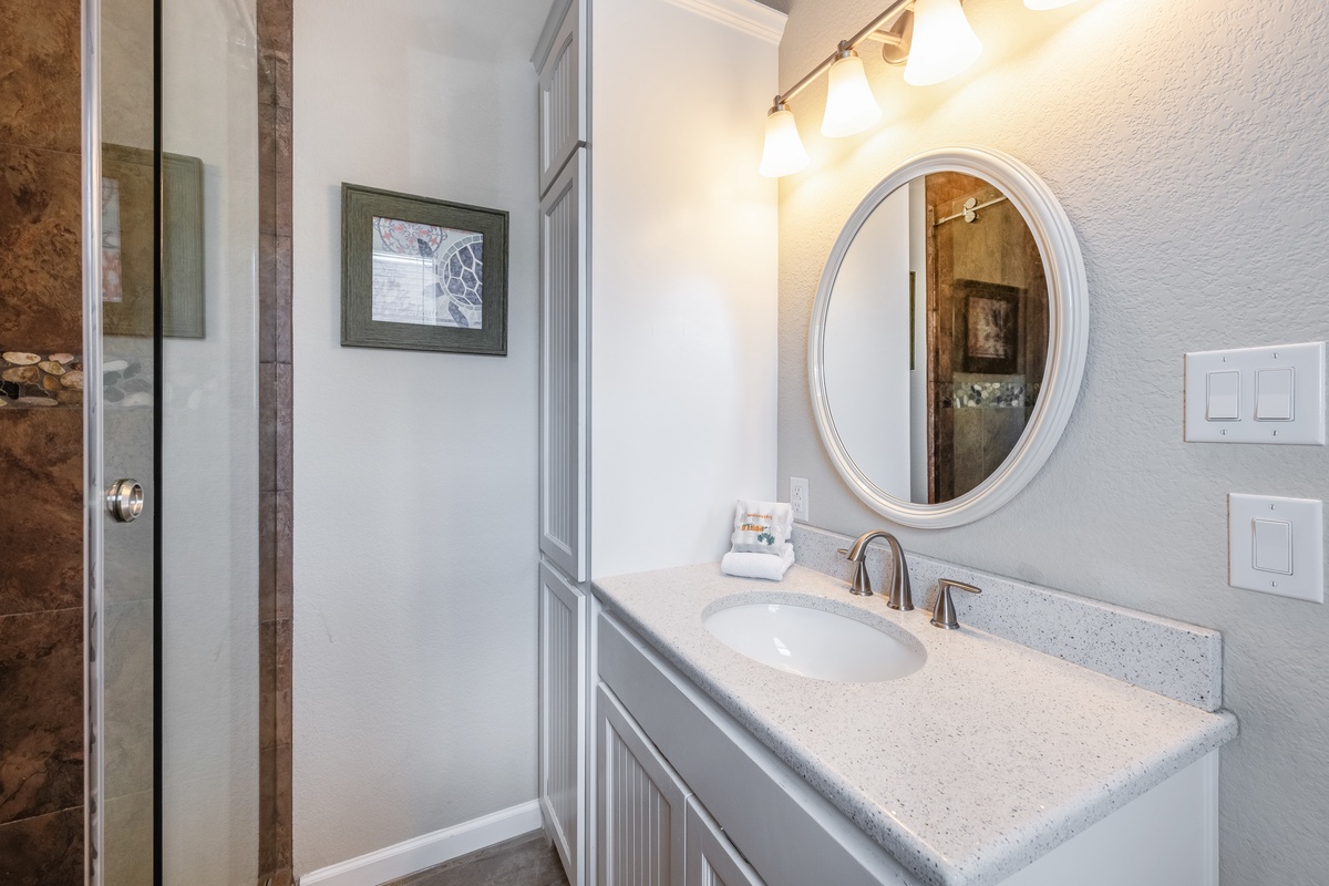 Step into your pristine bathroom with elegant fixtures and thoughtful amenities waiting for your arrival.