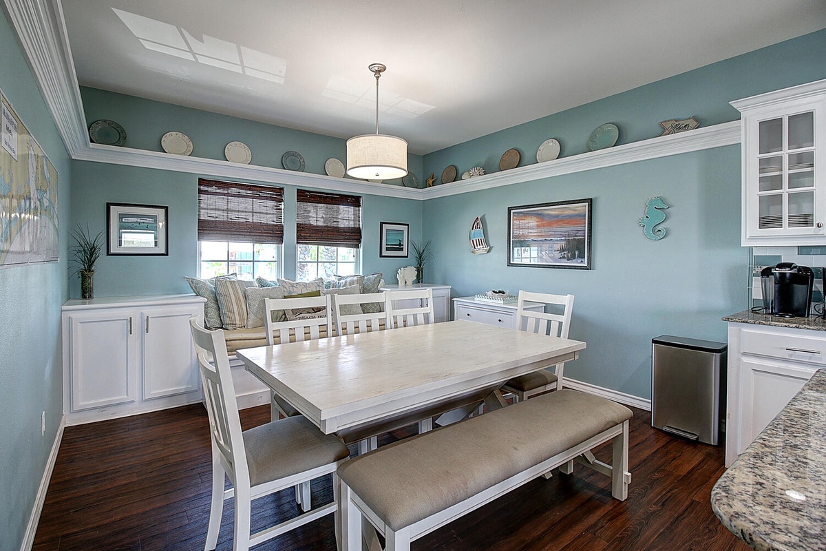 Your bright dining room offers coastal charm with seating for eight, perfect for family meals and game nights.