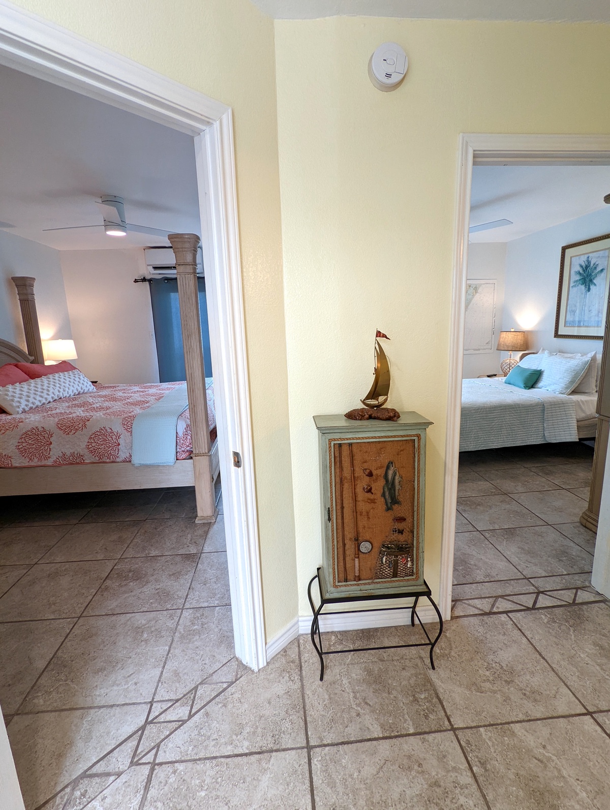 Your coastal-themed bedrooms beckon with nautical charm and comfortable furnishings, creating the perfect retreat for peaceful nights.