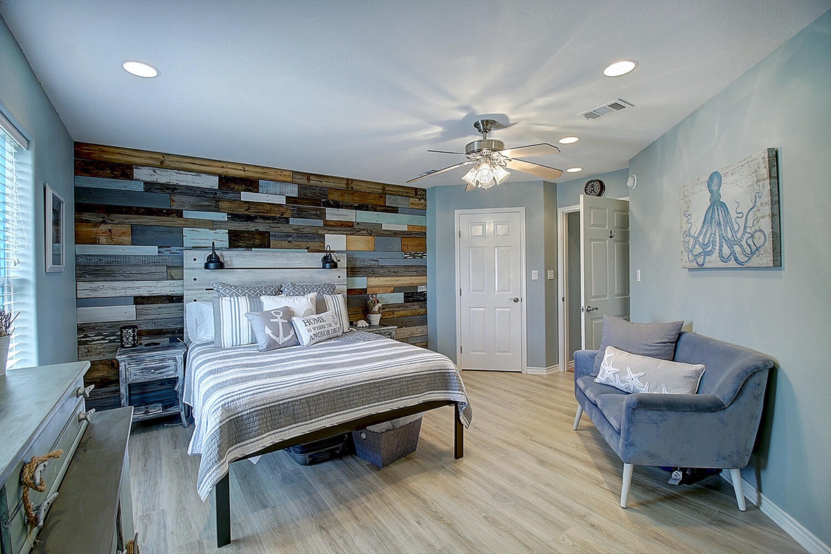 Drift off to sleep surrounded by coastal charm - your nautical bedroom features reclaimed wood, crisp linens, and soothing blues.
