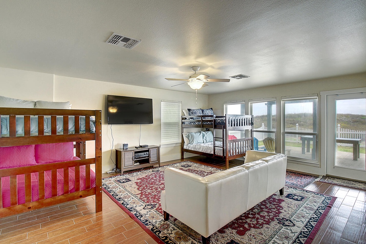 Your family room combines comfort and fun with bunk beds, cozy seating, and entertainment—perfect for creating lasting vacation memories together.