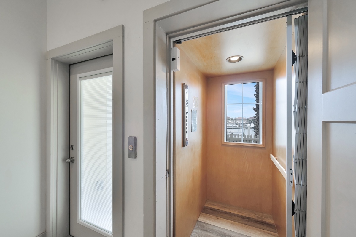 Step into your private elevator with panoramic city views through the glass walls as you travel to your floor.