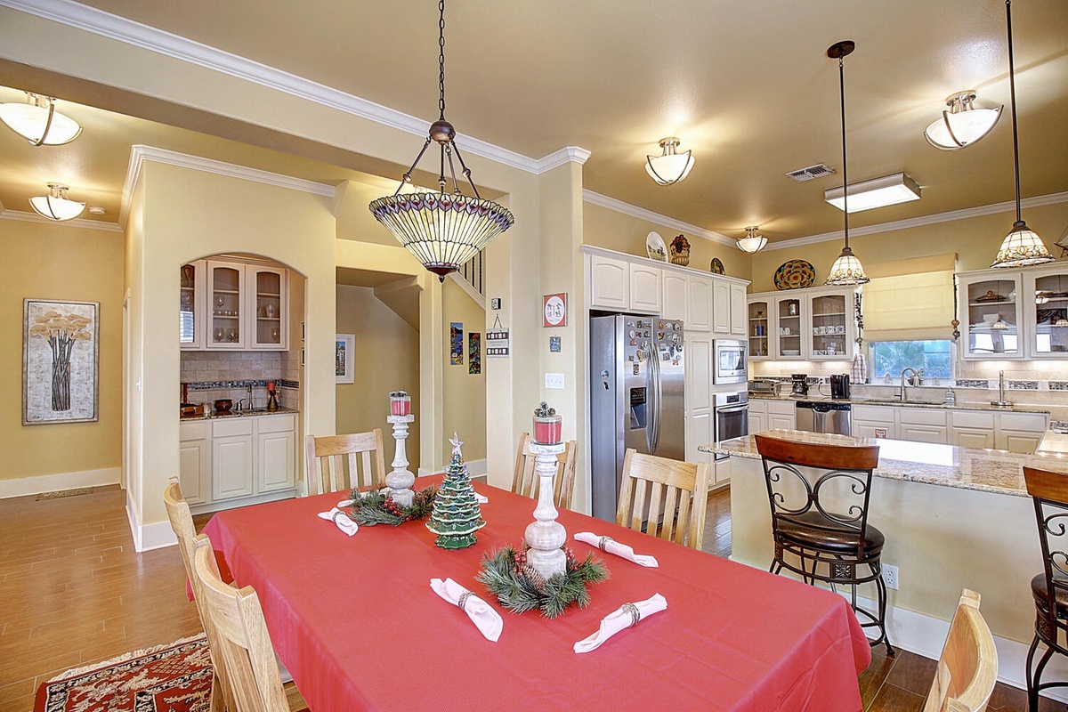 Your spacious open kitchen flows seamlessly into the dining area, perfect for cooking together and sharing memorable meals around the elegant table.