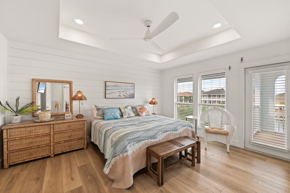 Sink into your beautifully styled coastal bedroom, where soft natural light and warm wood tones create a serene escape. The glass doors invite you to step out onto your private balcony and breathe in the fresh air.