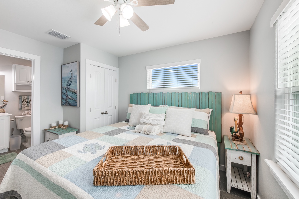 Drift off in this serene bedroom where coastal colors and soft textures create your perfect retreat.