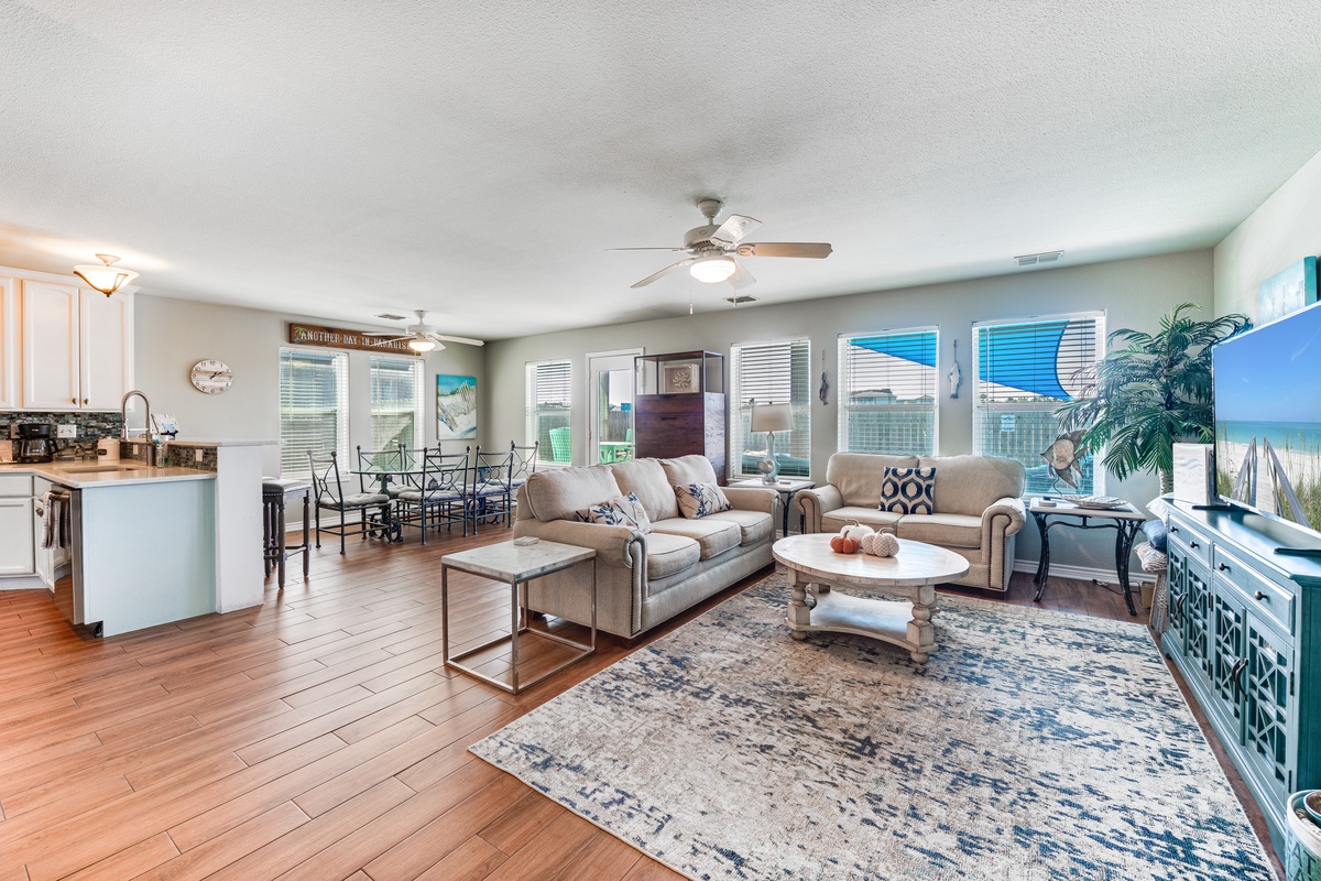 Relax in your spacious oceanfront living room where coastal comfort meets modern style, complete with stunning sea views.