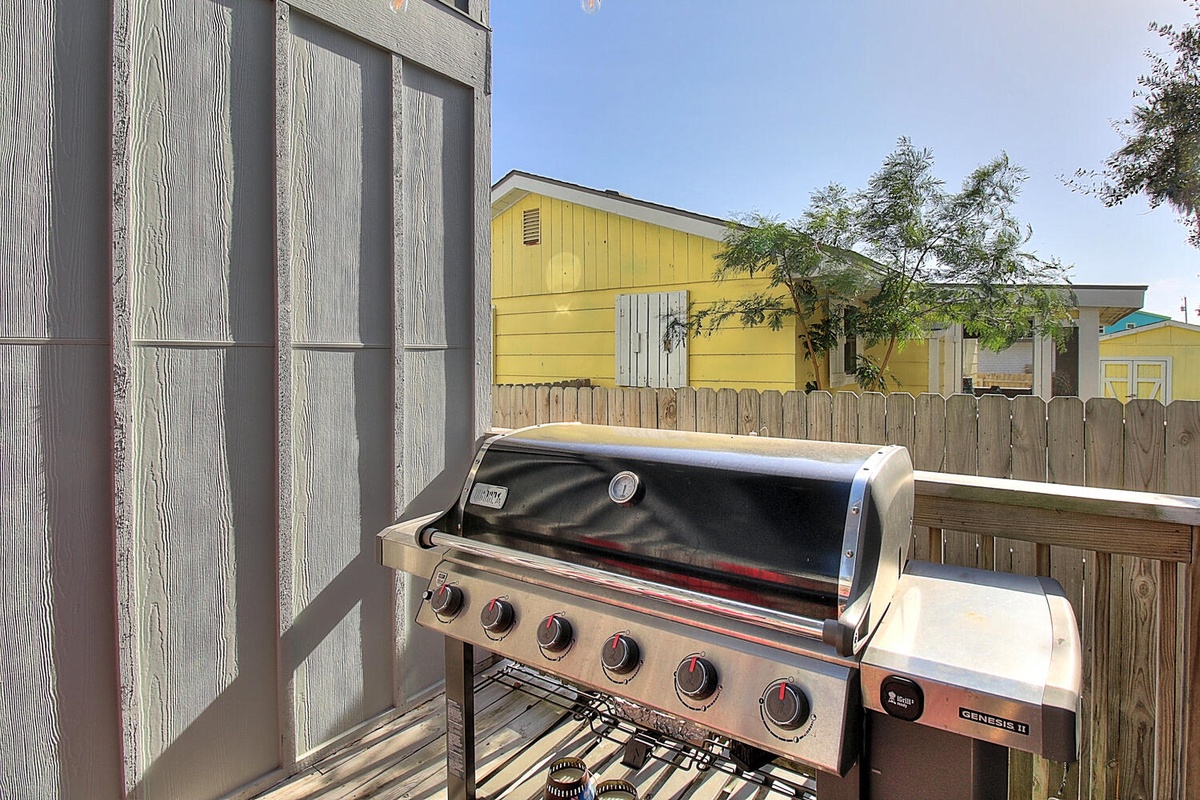 Fire up this premium gas grill and savor your outdoor cooking experience on the spacious deck.