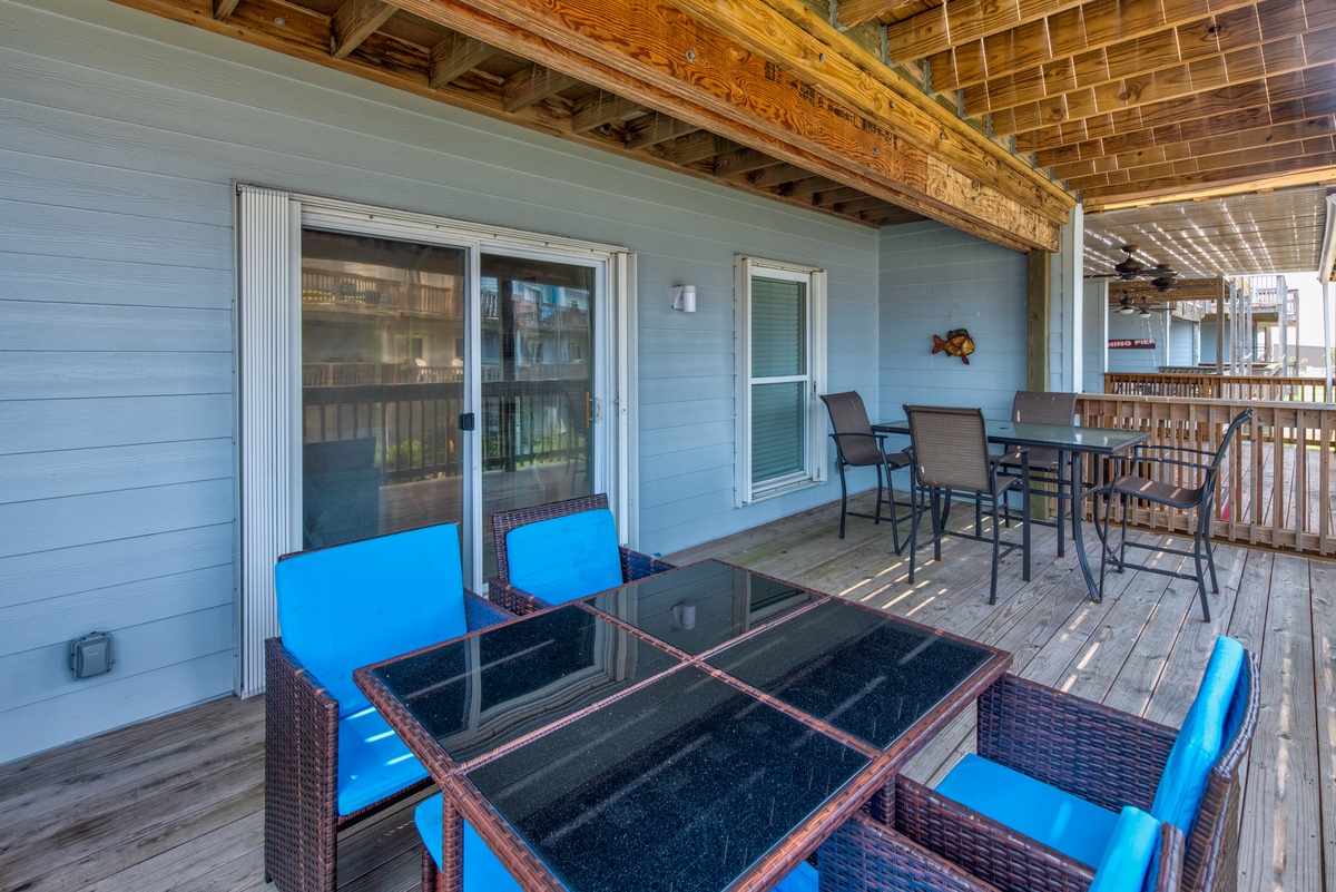 Your private deck offers plenty of space to dine, relax, and soak up coastal breezes with comfortable outdoor furniture.