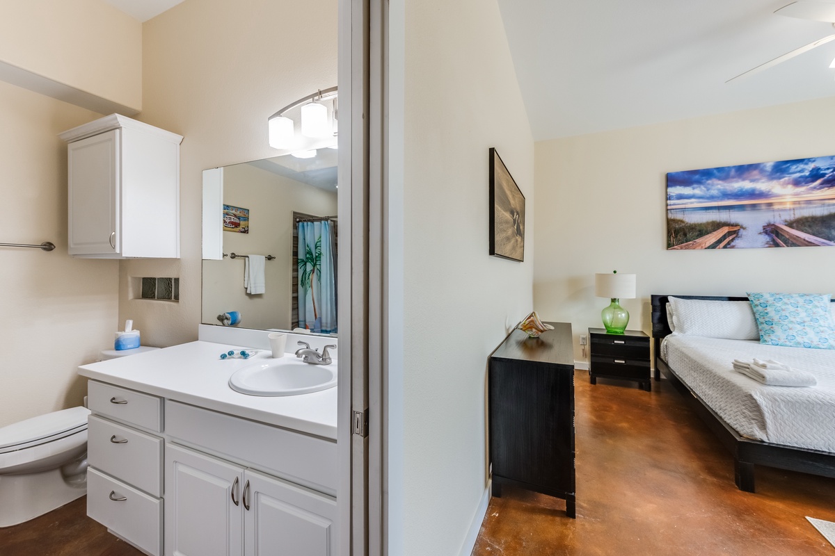 Step into your private ensuite where morning routines feel effortless, with fresh towels and modern fixtures just steps from your comfortable bed.