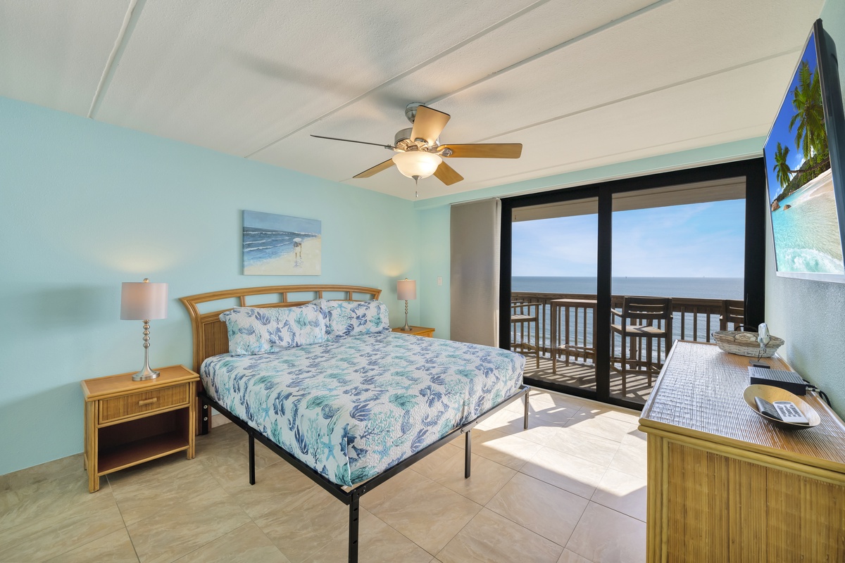 Wake up to endless ocean views from your coastal bedroom, where gentle sea breezes flow through sliding doors to your private balcony.