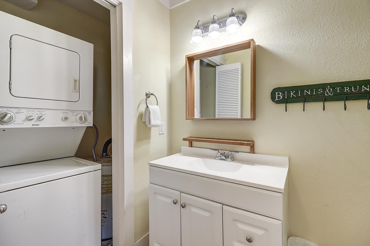 Your bathroom features a spacious vanity and convenient in-unit washer and dryer for ultimate comfort during your stay.