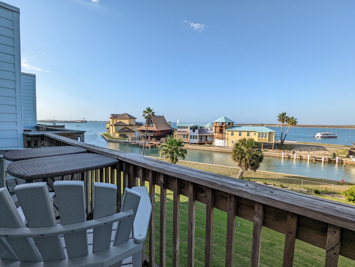 Sip your morning coffee from these comfortable deck chairs while watching sailboats glide across sparkling waters lined with charming waterfront homes.