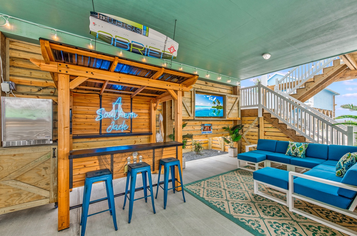 Your private tiki bar awaits with tropical vibes, comfy seating, and that perfect vacation atmosphere for evening cocktails.