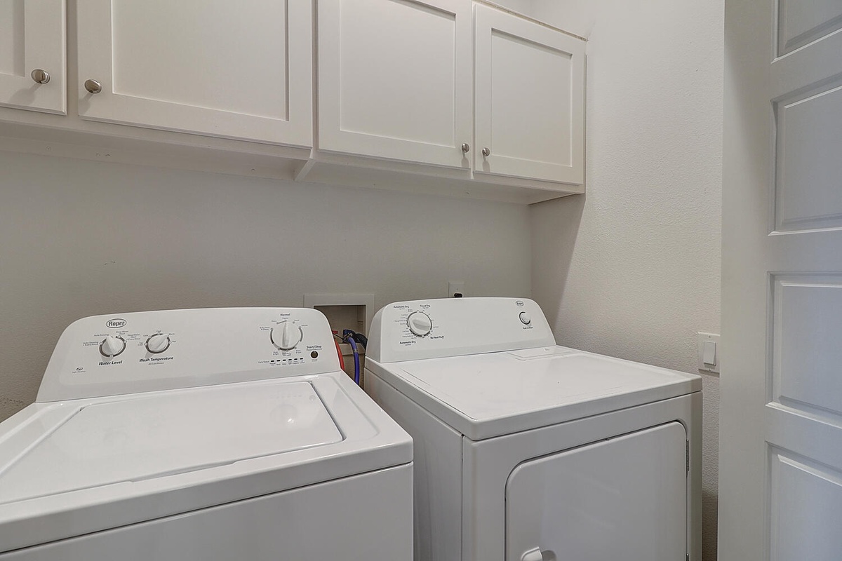 Your dedicated laundry room makes extended stays effortless with full-size washer and dryer plus generous storage space.