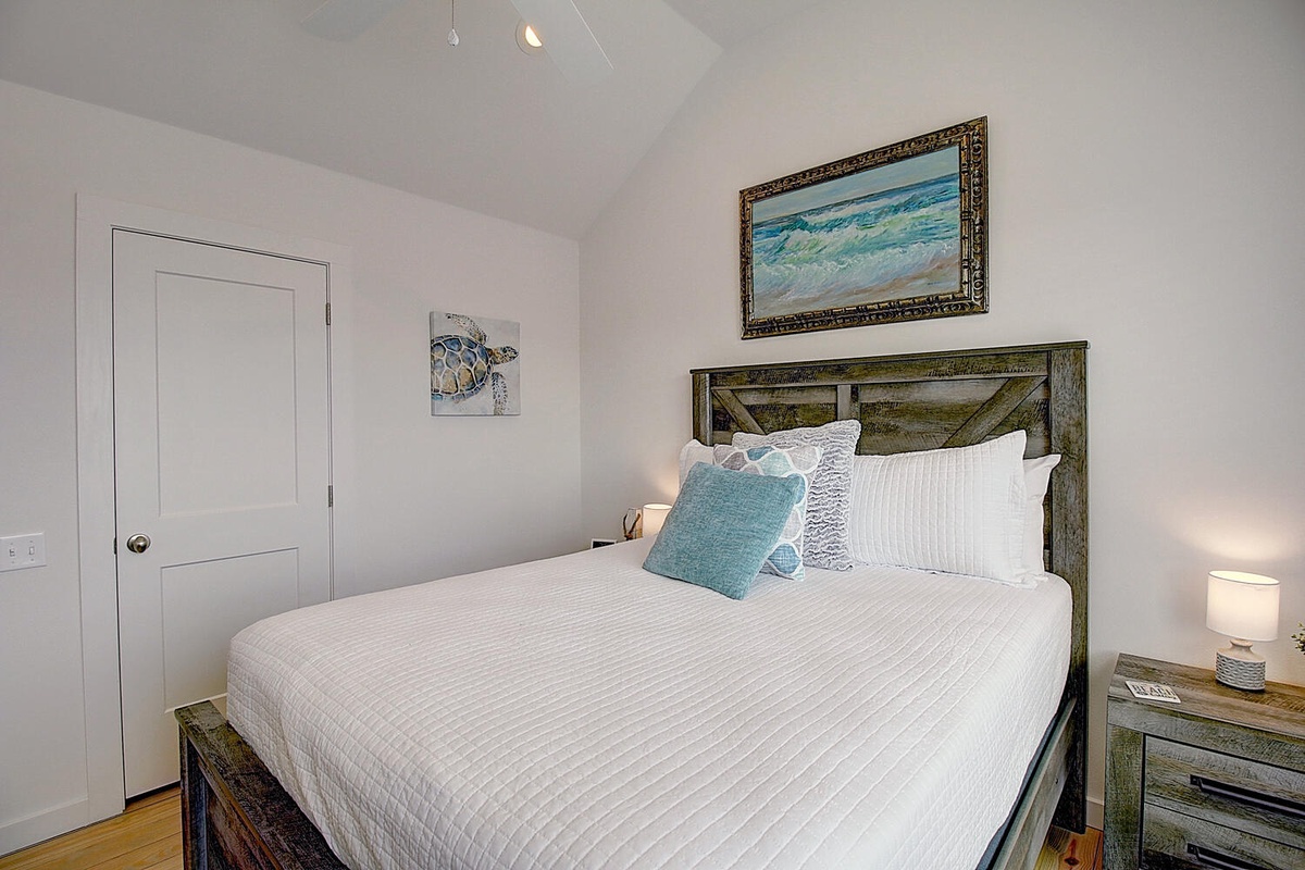 Drift off in your coastal retreat with ocean-inspired art and plush linens creating the perfect seaside sanctuary.