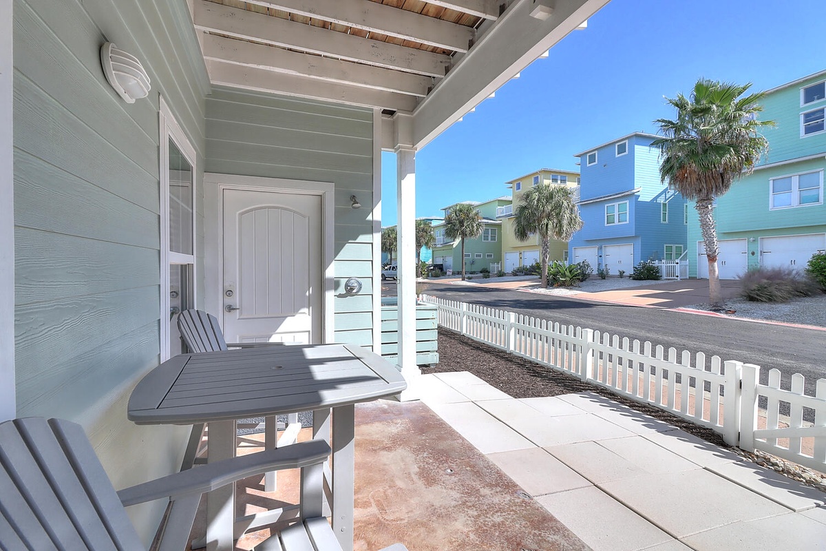 Your private patio offers the perfect spot to sip morning coffee while taking in the colorful coastal neighborhood views.