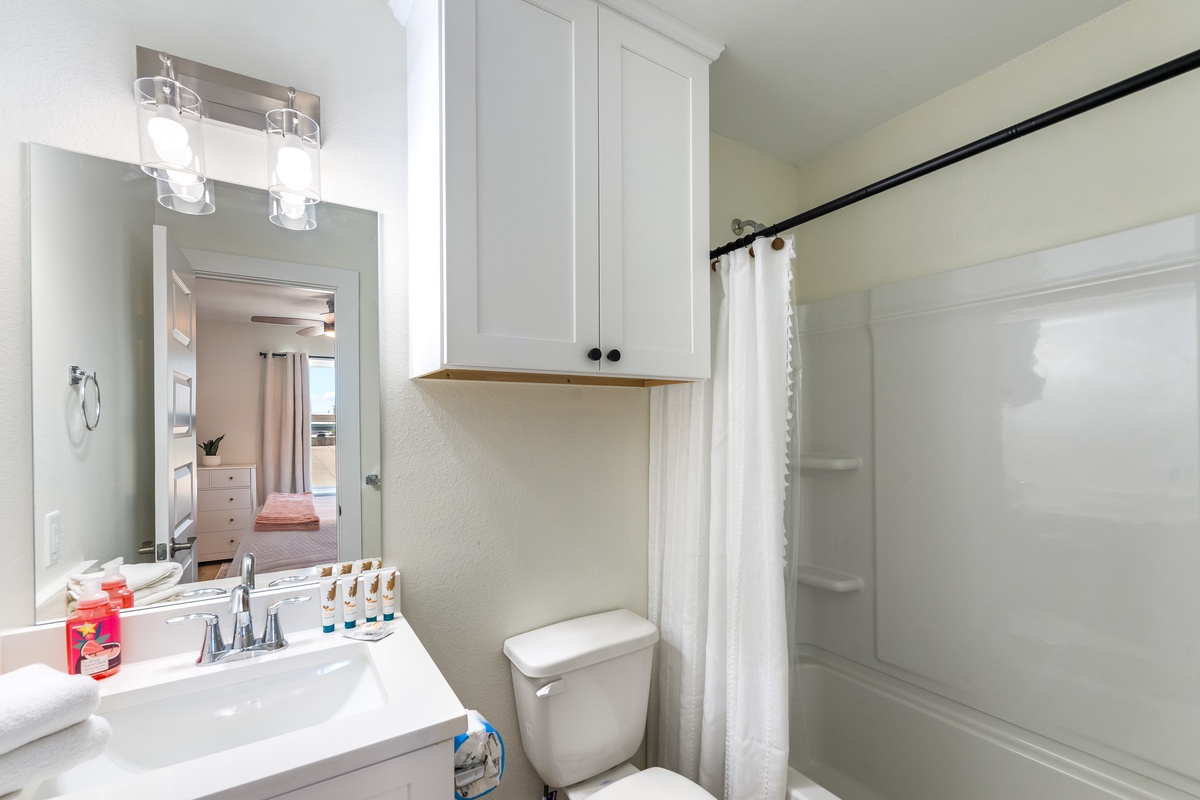 Your private bathroom features fresh linens, a spacious shower, and thoughtful touches to make your stay comfortable and refreshing.