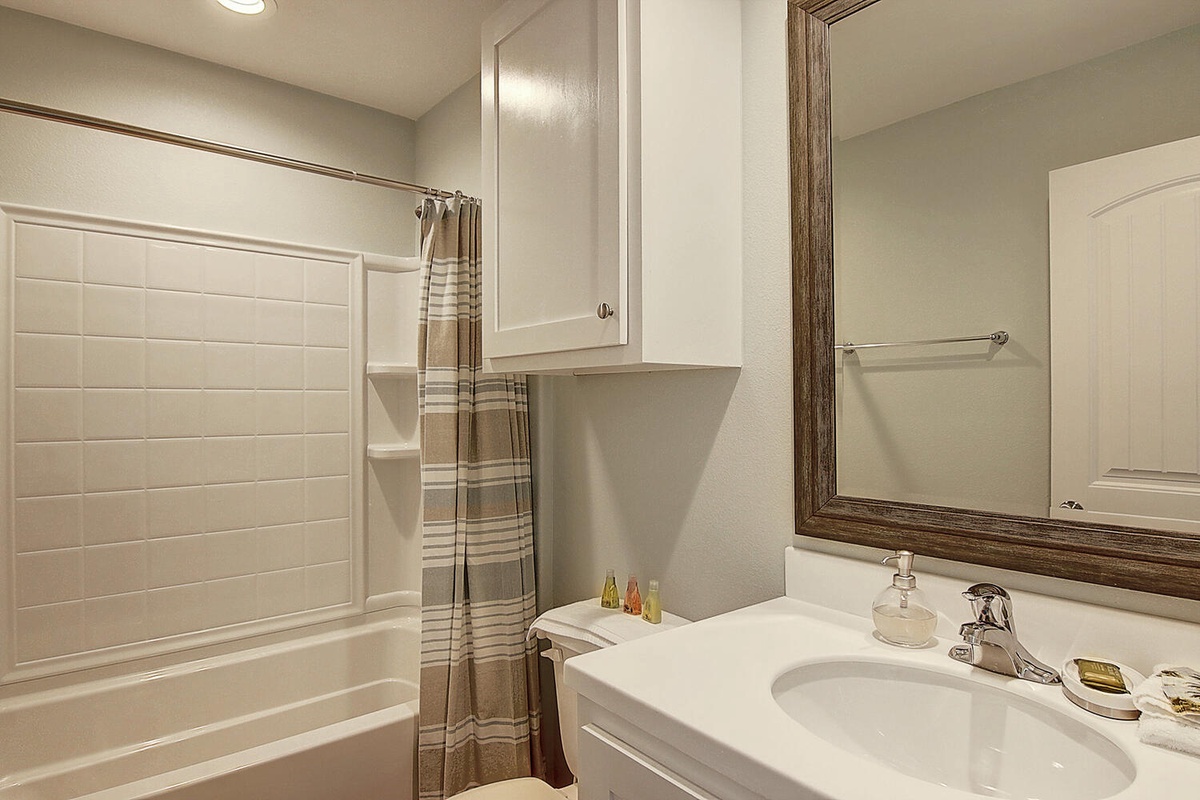 Refresh in your private bathroom with modern amenities, clean lines, and thoughtful touches that make your stay comfortable.