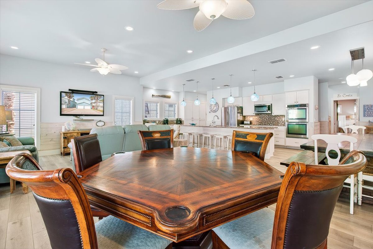 Your spacious dining room flows seamlessly into the bright kitchen, perfect for gathering with family over home-cooked meals.