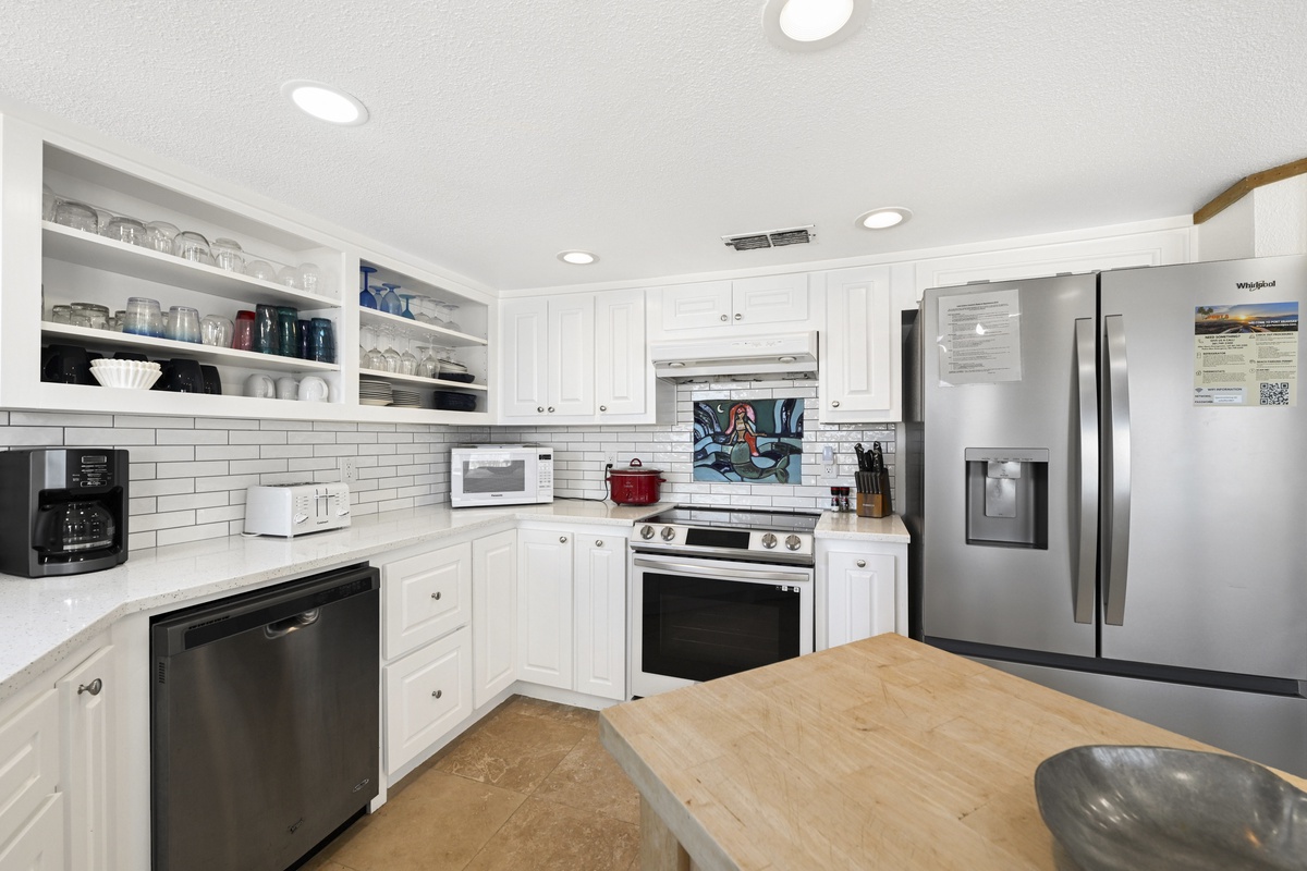 Your fully equipped kitchen features modern appliances, ample counter space, and everything you need to prepare delicious meals during your stay.
